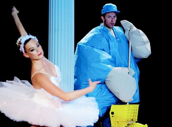 Watch Chris Martin and Jessica Lucas Dance in Sumo Suits in Coldplay’s ‘True Love’ Music Video